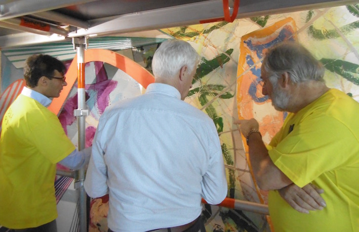 Consulting with conservator Andrew Durham