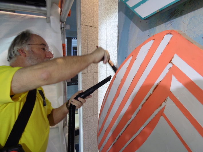 Brush vacuuming to remove build up of dust