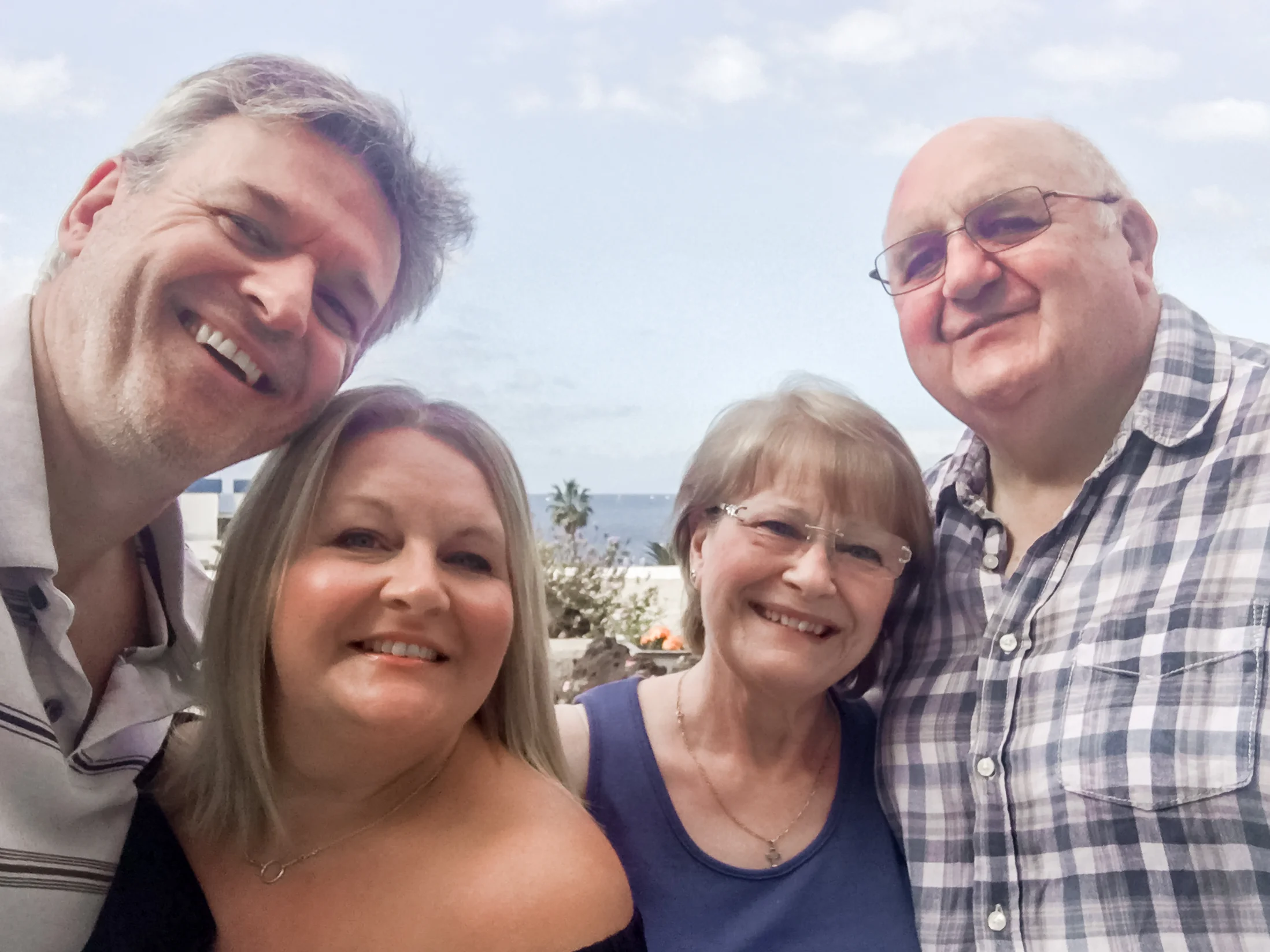 Us with Mummy & Daddy Ess, on our balcony on our last day, getting everyone together for our obligatory family selfie - my mum the nest building mother hen and my daddy my superhero!