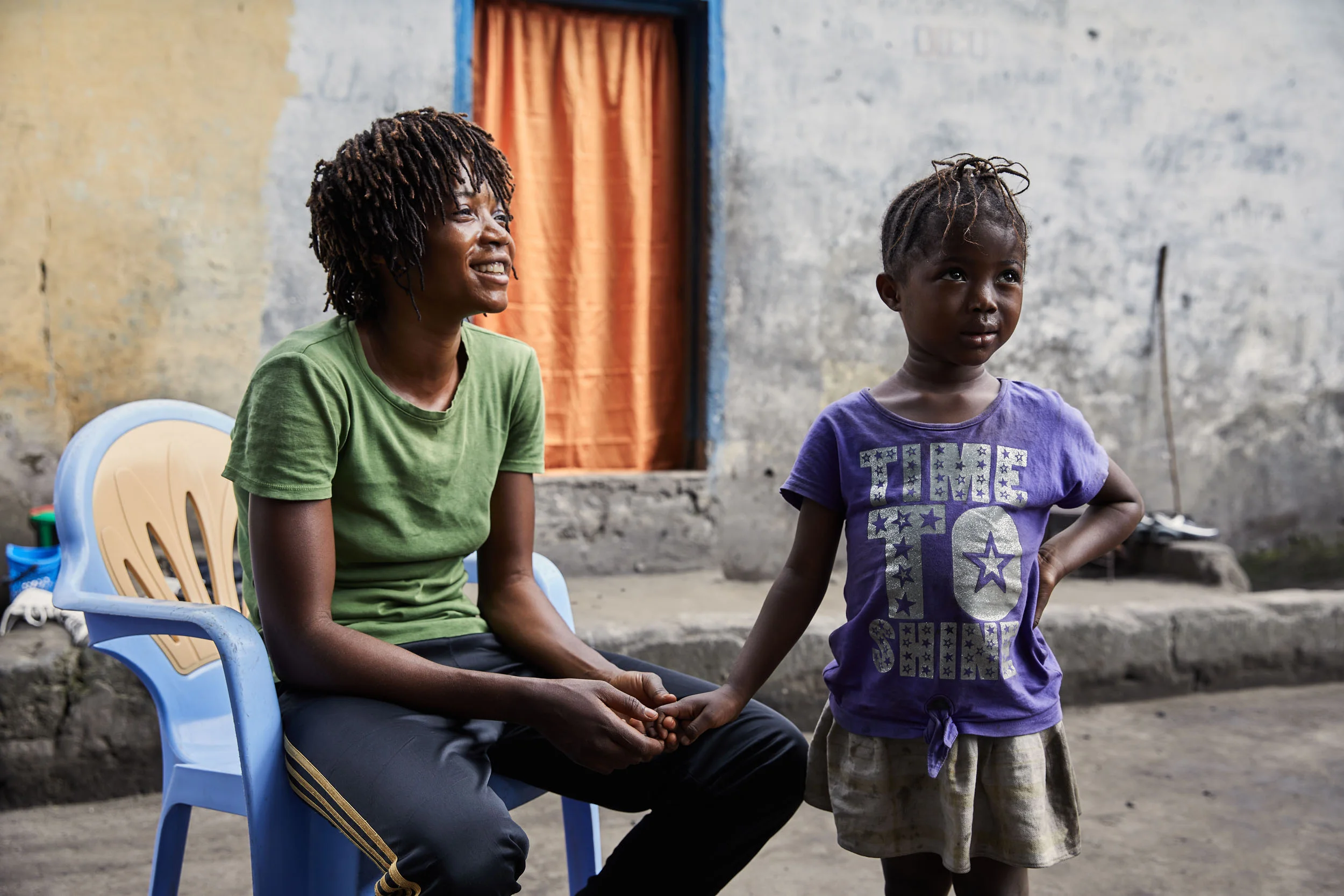 Miki Ndaya and her daughter Princess at home in Kinshasa.