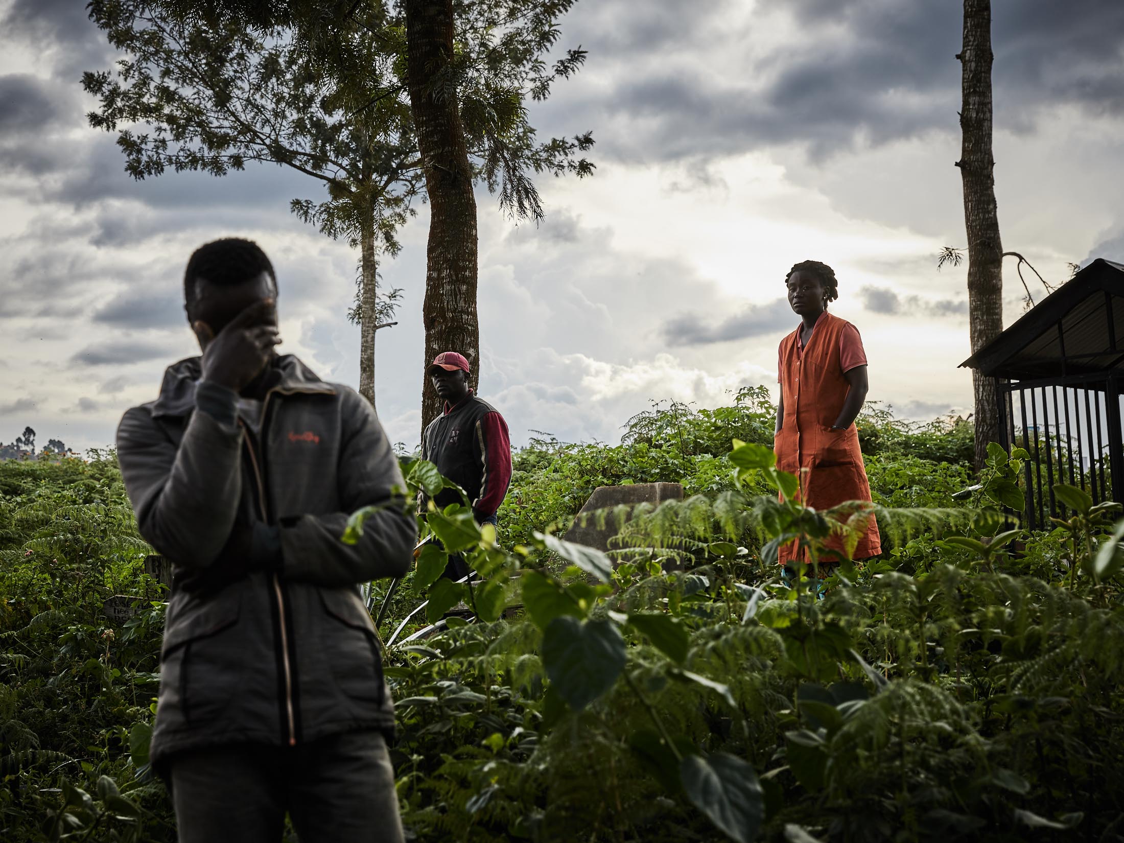  Mourners at Kitatumba cemetery, Butembo.  