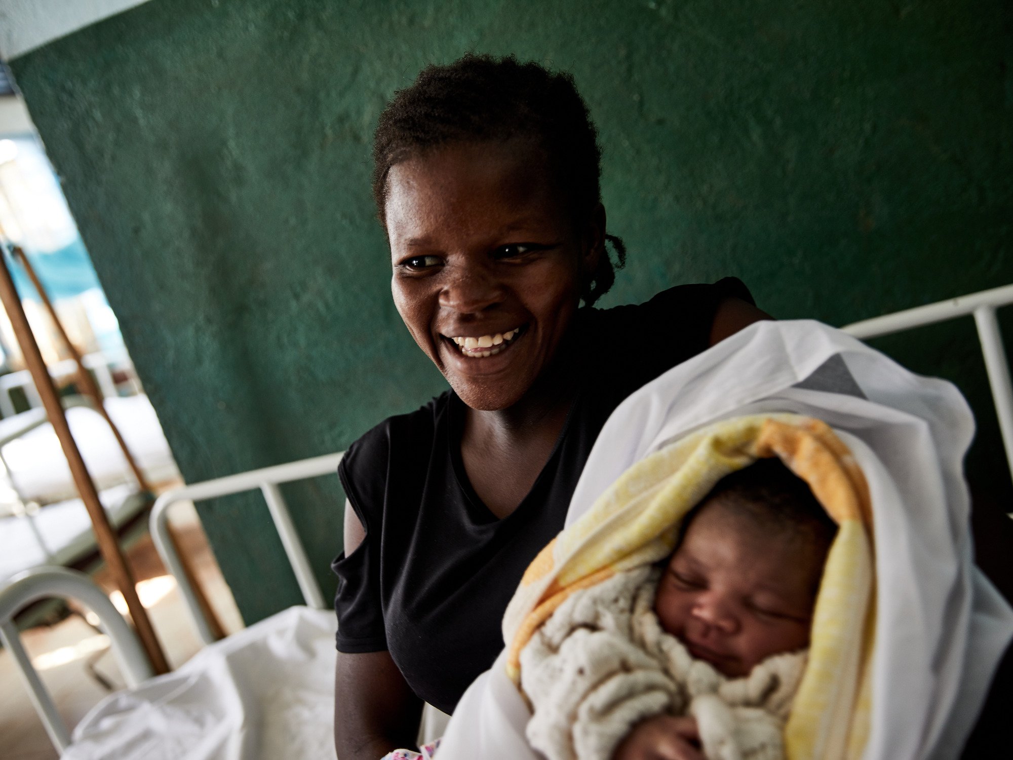  Gina with her newborn baby Bienvenue. Refugees from Central African Republic for  UK for UNHCR .  