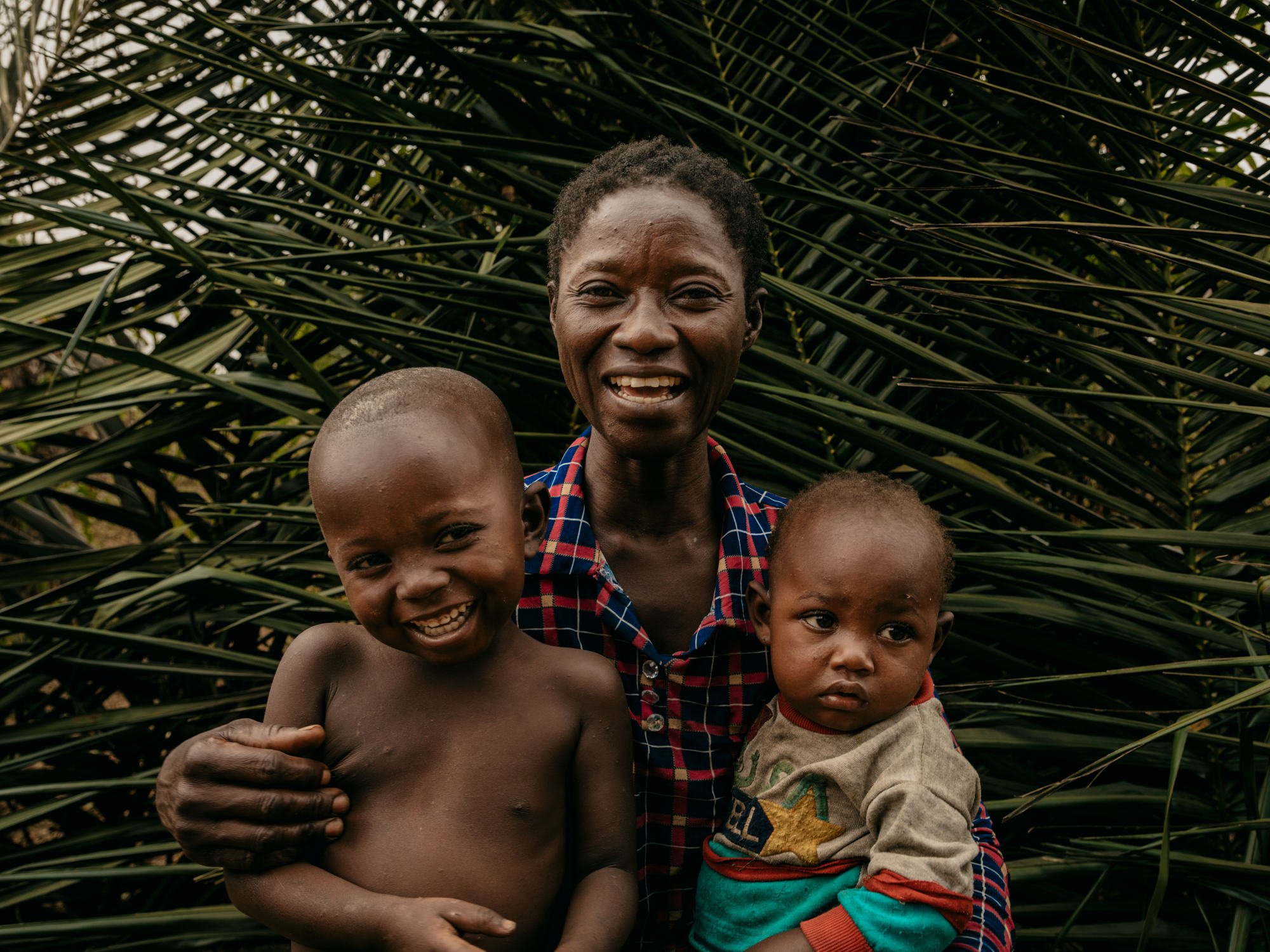  Lele with her family, survivors of the Kasaï Conflict, for  Save the Children.   