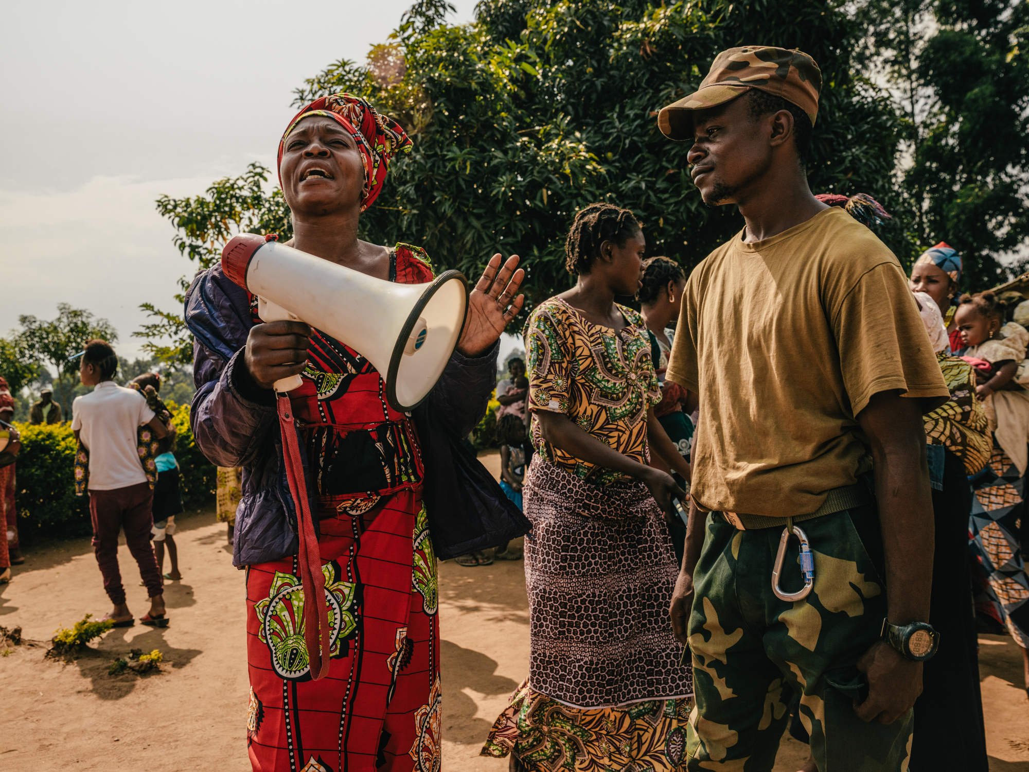  Madeline Akida speaks during a dialogue event between local women and the families of a Congolese Army commando unit. 