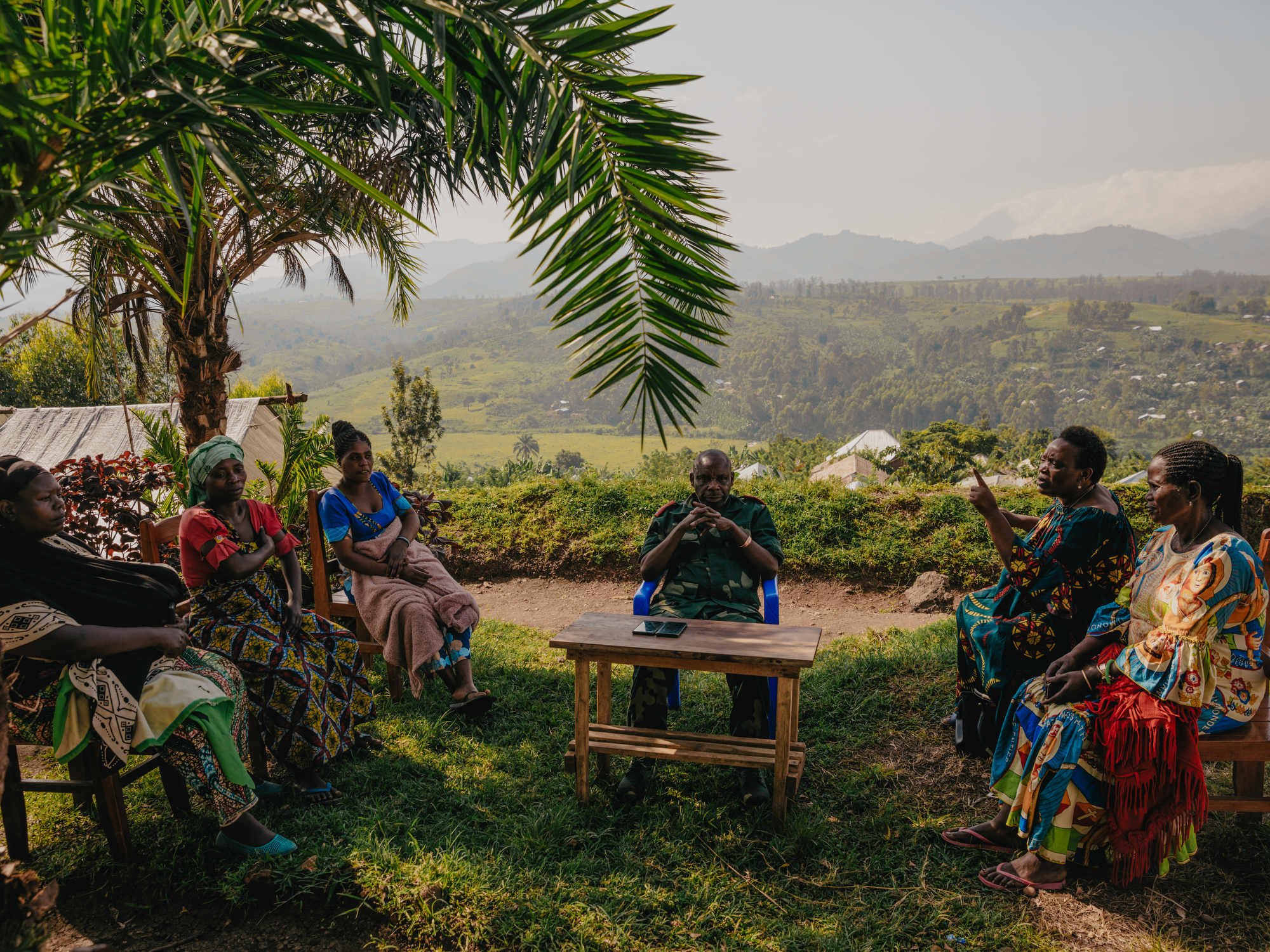  Led by peace activist Liberata Buratwa, displaced women meet with Congolese army General Peter Cirimwami, commander of operations against the M23 rebel group 