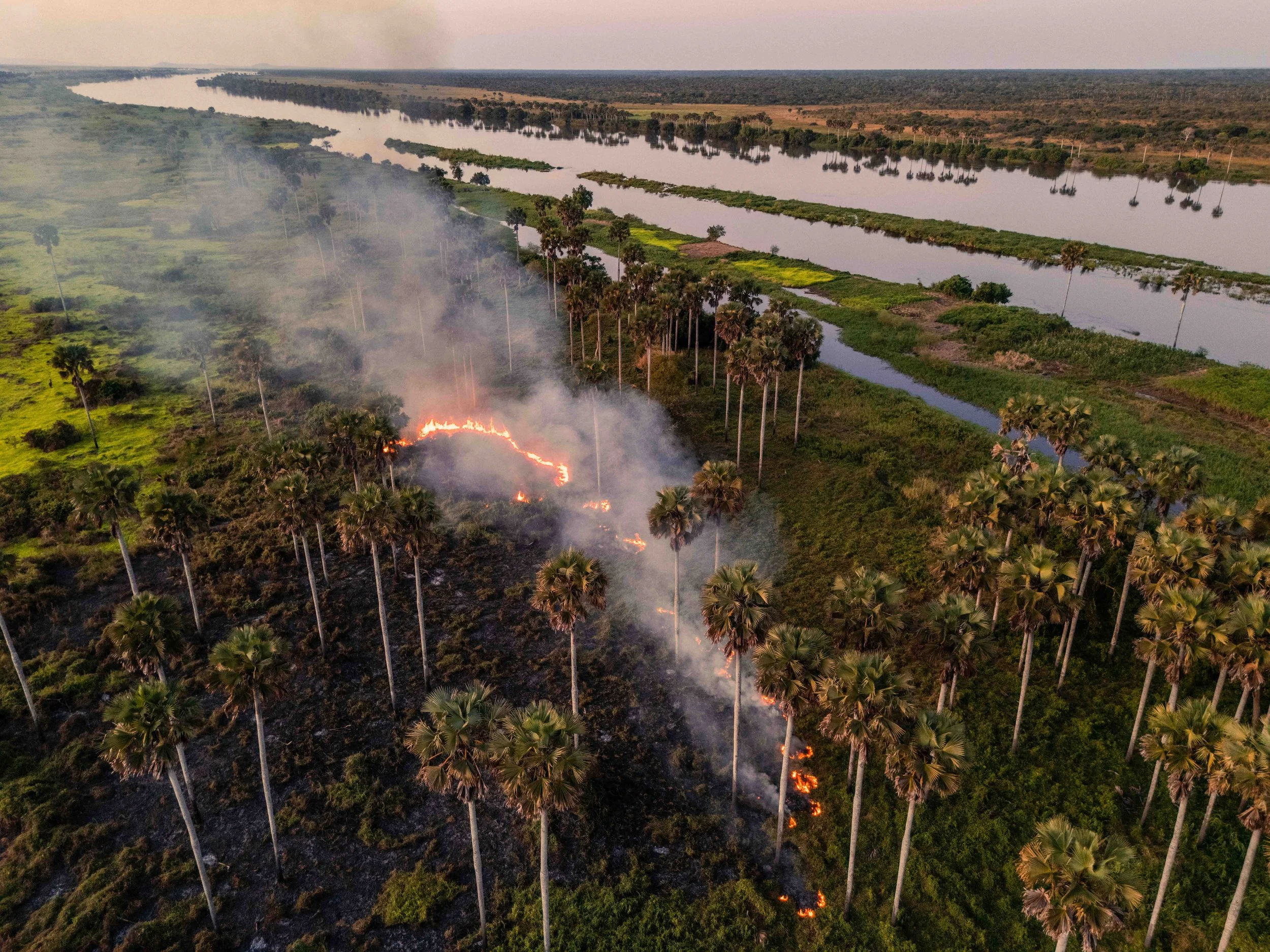 Clearance fires along the Lualaba river at Ankoro. Tanganyika, DRC.