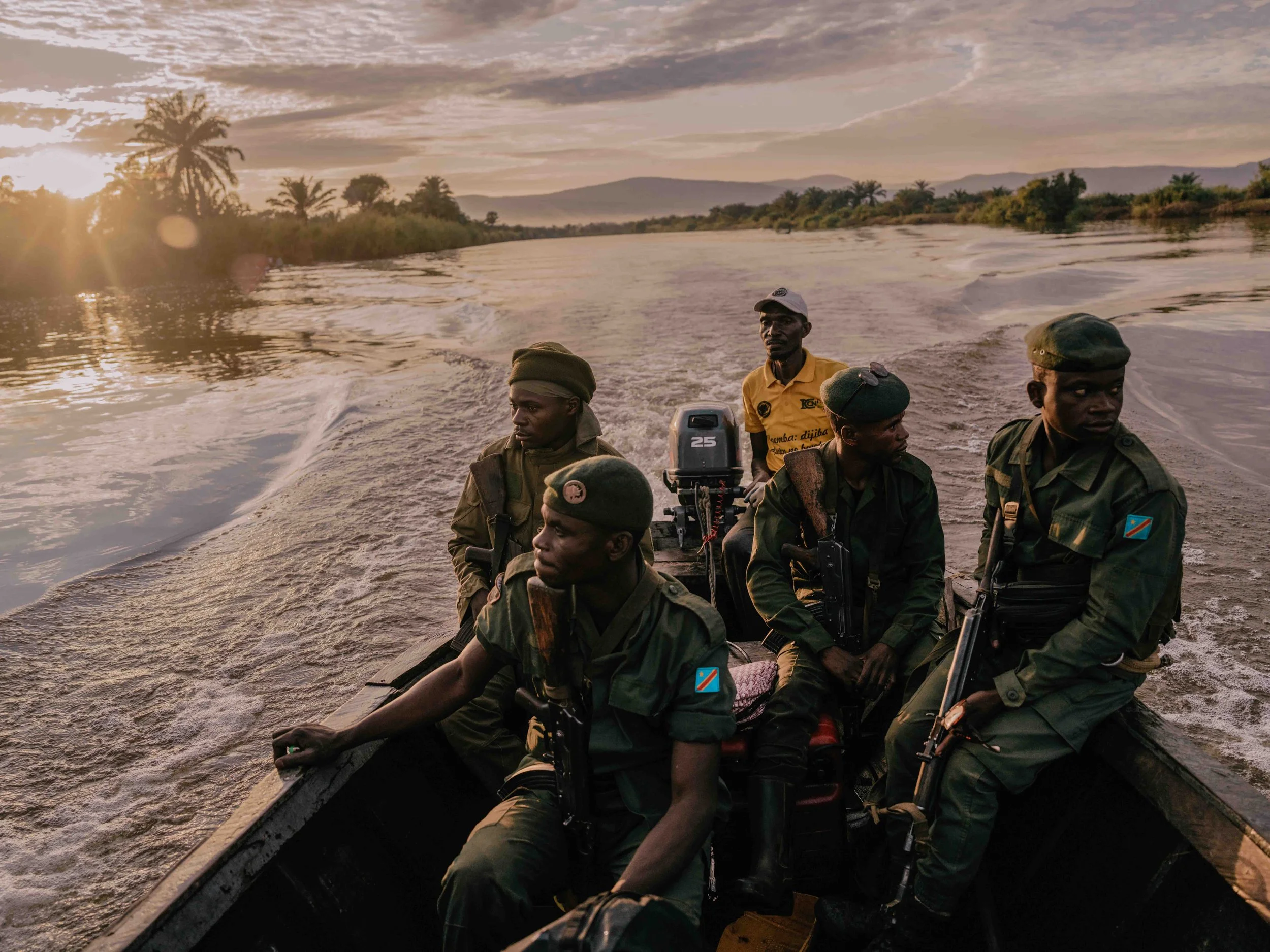 Upemba National Park rangers on patrol along the Lufira river. Haut-Lomami, DRC.