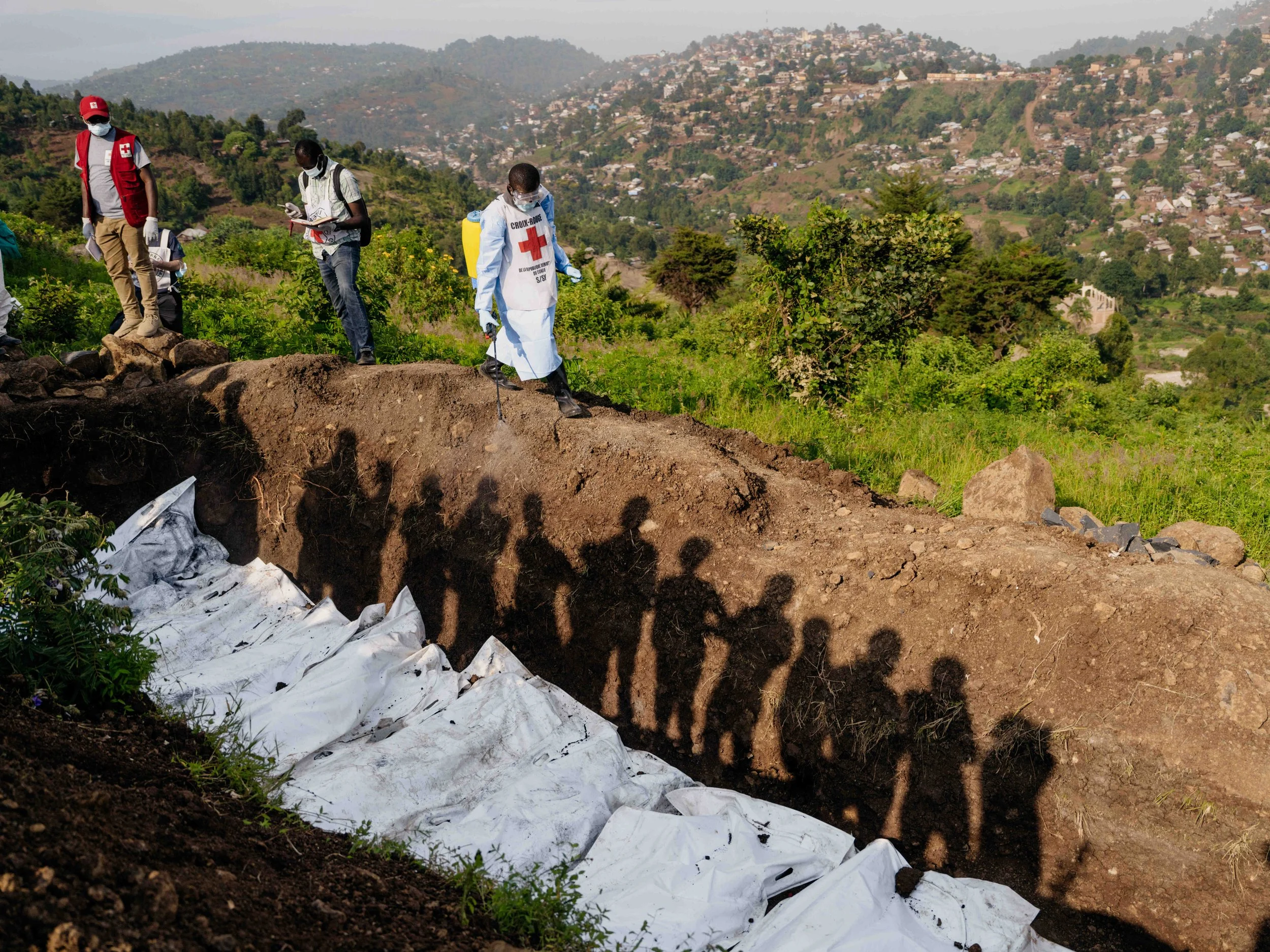  A mass burial in the wake of the M23 rebel capture of the city of Bukavu, the provincial capital of South Kivu Province. 