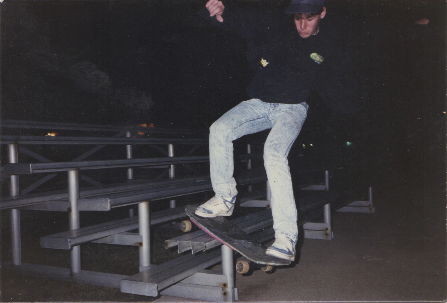 Craig Dransfield board slides the end of the bleachers at the Athens swimming pool. Photo Courtesy of Craig Dransfield. 