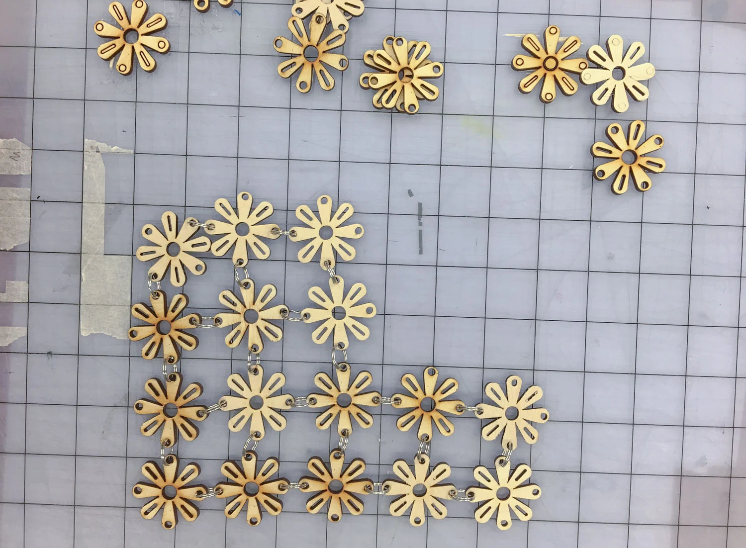 Sample at smaller scale, laser cut wood floral