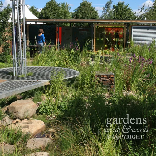 The two main rain havesting structures in the Working Wetlands garden by Jeni Cairns, the pavillion on the left, and the visitor information centre across the back.