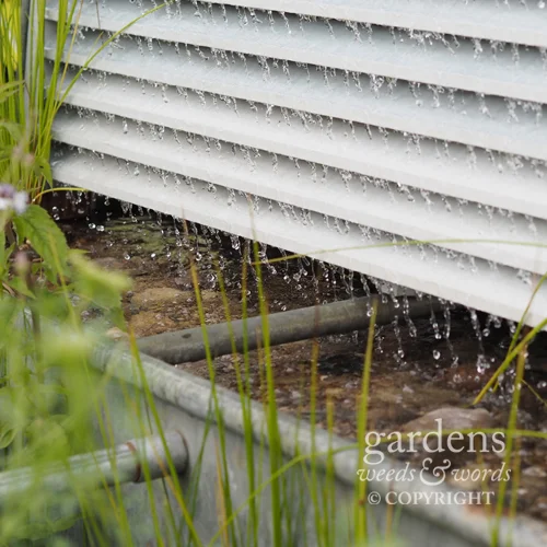 Detail from the Working Wetlands garden by Jeni Cairns, showing the steel louvres which filter rainwater before it passes into a secondary gravel filtering system.