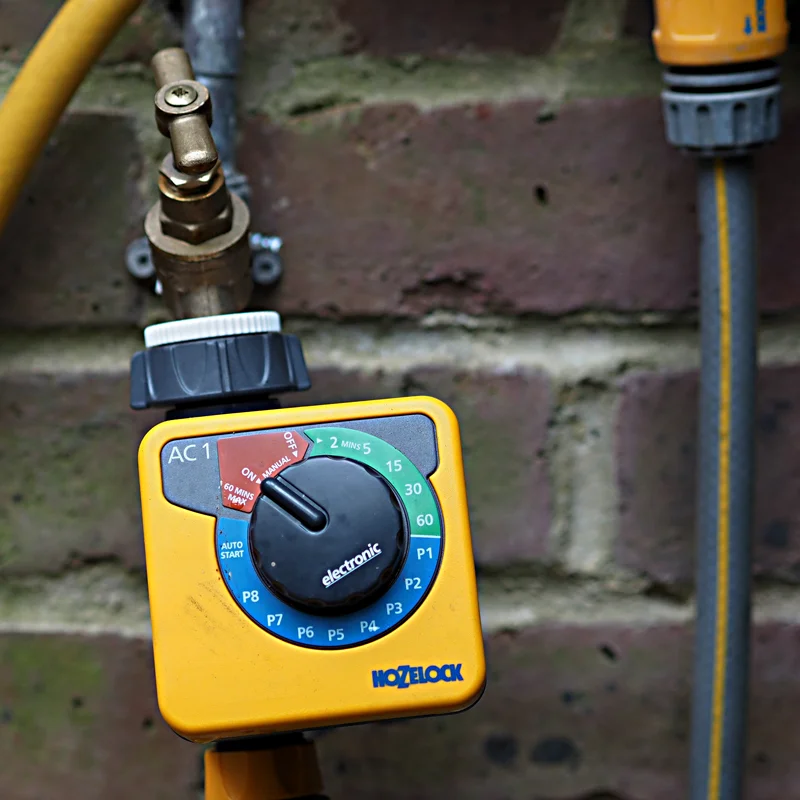 A simple timer can take care of your watering when you need to be away from your garden for a few days. 