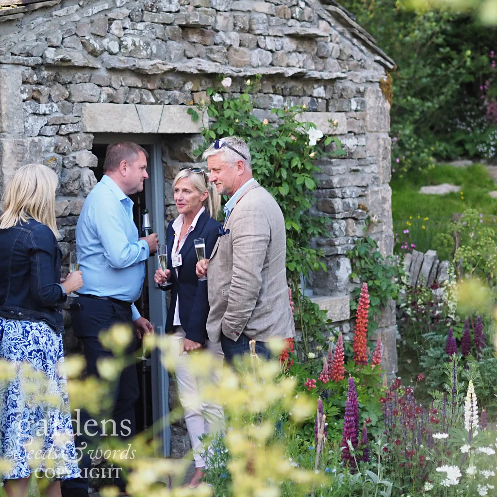 Gardens always look better with people in them . Detail from the Welcome to Yorkshire garden from Mark Gregory , RHS Chelsea Flower Show 2018