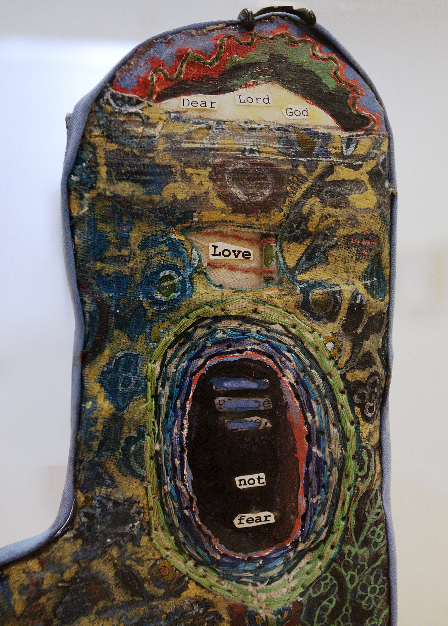   Prayer Paddle: Love Not Fear (detail) , mixed media, 15 by 13 ½ inches, 2007-2014. 