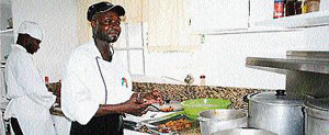 Chef ‘Oliver’ prepares conch fritters, a special at Villa Juanita.