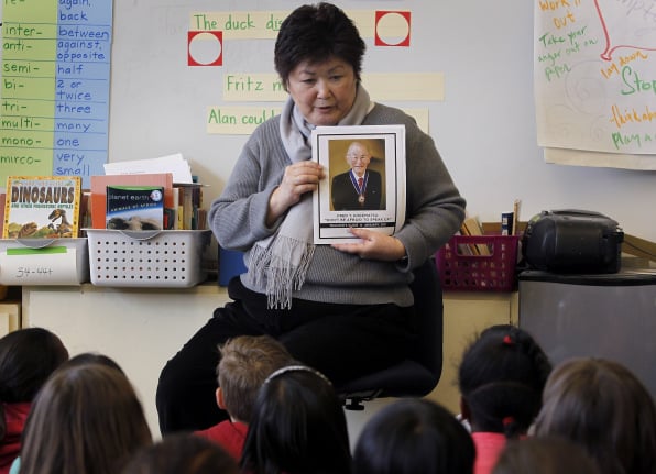 Third grade teacher Joanne Kataoka tells her students about her uncle, Fred Korematsu, two days before California’s first Fred Korematsu Day on January 30, 2011. Kataoka received a free teaching kit from the Korematsu Institute. Photo taken at Lorenzo Manor elementary school in San Lorenzo, CA. Photo by Paul Chinn/San Francisco Chronicle/Corbis