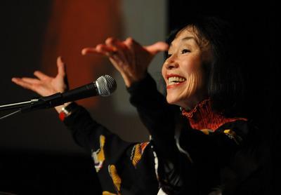 Karen Korematsu, daughter of Fred Korematsu, gestures while wishing her father a happy birthday while attending a celebration during the first Fred Korematsu Day on Sunday, Jan. 30, 2011, at Wheeler Hall at the University of California in Berkeley, Calif. In 1942, Fred Korematsu, 23 years old, refused to go to a Japanese-American internment camp and was arrested in downtown San Leandro. After his conviction, Korematsu took his case to the U.S. Supreme Court where the it was upheld. In 1983, a federal court in San Francisco overturned the conviction. The celebration of Fred Korematsu’s birthday is the first day in U.S. history named after an Asian American. (Jose Carlos Fajardo/Staff)