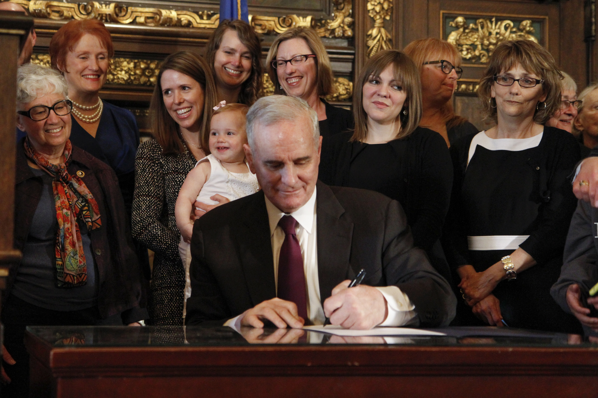Read about our work on the Women's Economic Security Agenda , a package of laws passed in 2014 addressing the gender pay gap, family and sick leave, workplace discrimination, and more.