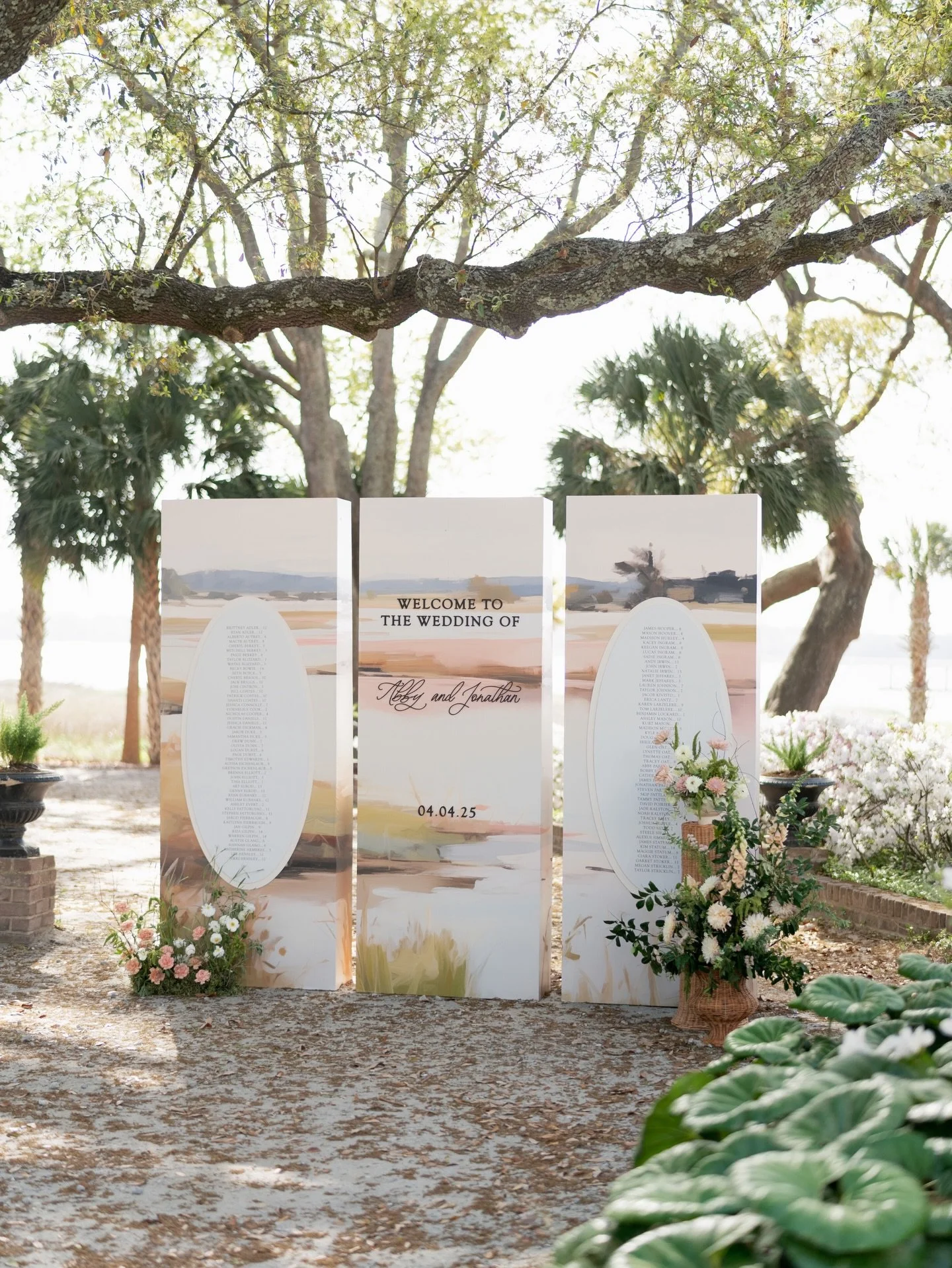 Abby &amp; Jonathan wanted their guests to feel the magic of Charleston from the moment cocktail hour began. We turned a soft pastel painting into an 8-foot, three-panel seating chart that welcomed guests into the reception.  Framed by Spanish moss a