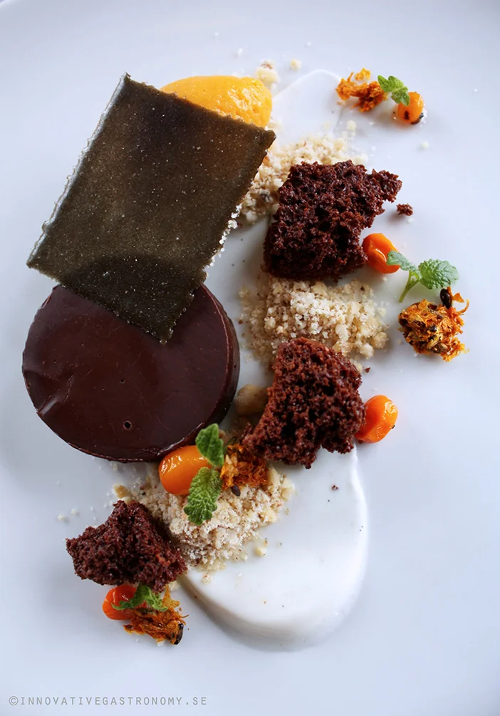 Chocolate ganache with sea buckthorn sorbé, dried chocolate mousse and liquorice