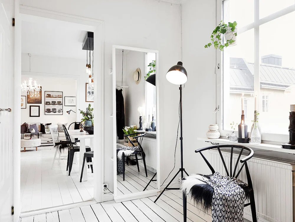 White exposed floorboards are a real modern Scandinavian classic. Try off-setting with warm rugs or throws - the Danes call it 'hygge' - which roughly translates as 'cosy'! Image source found here