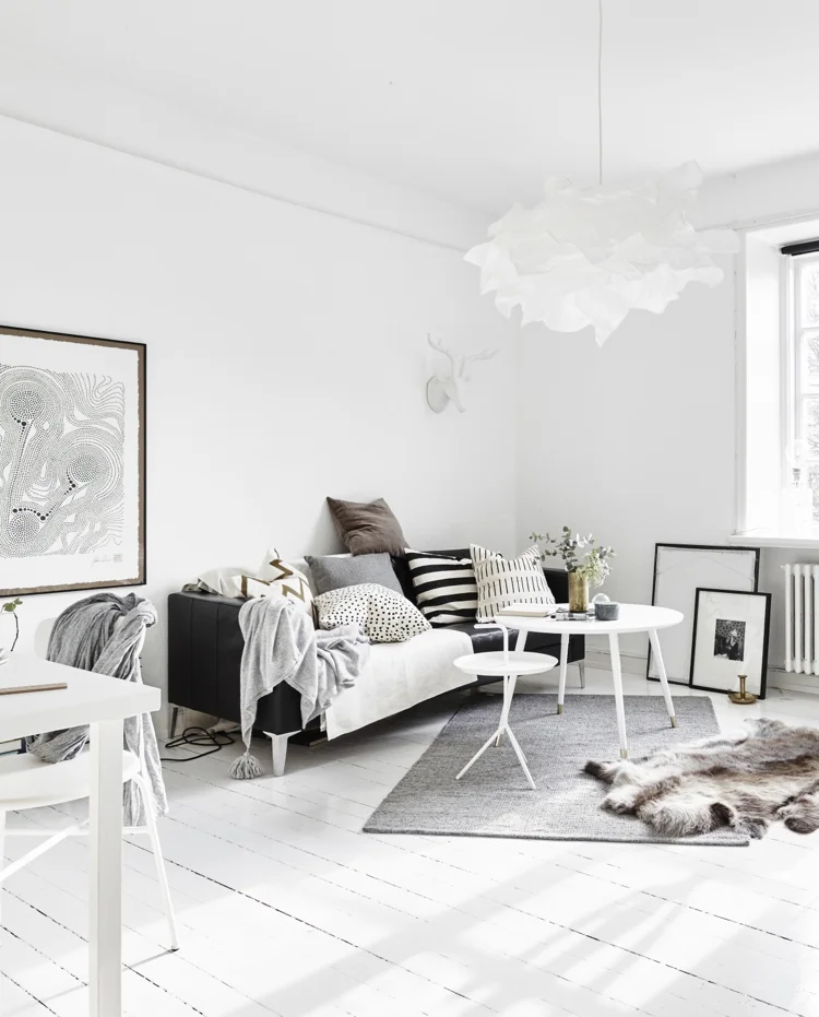 This is a great example of a more subtle, relaxed monochrome style. Not all Scandi design has to cost a fortune - that beautiful ceiling light is from Ikea! Image source found here
