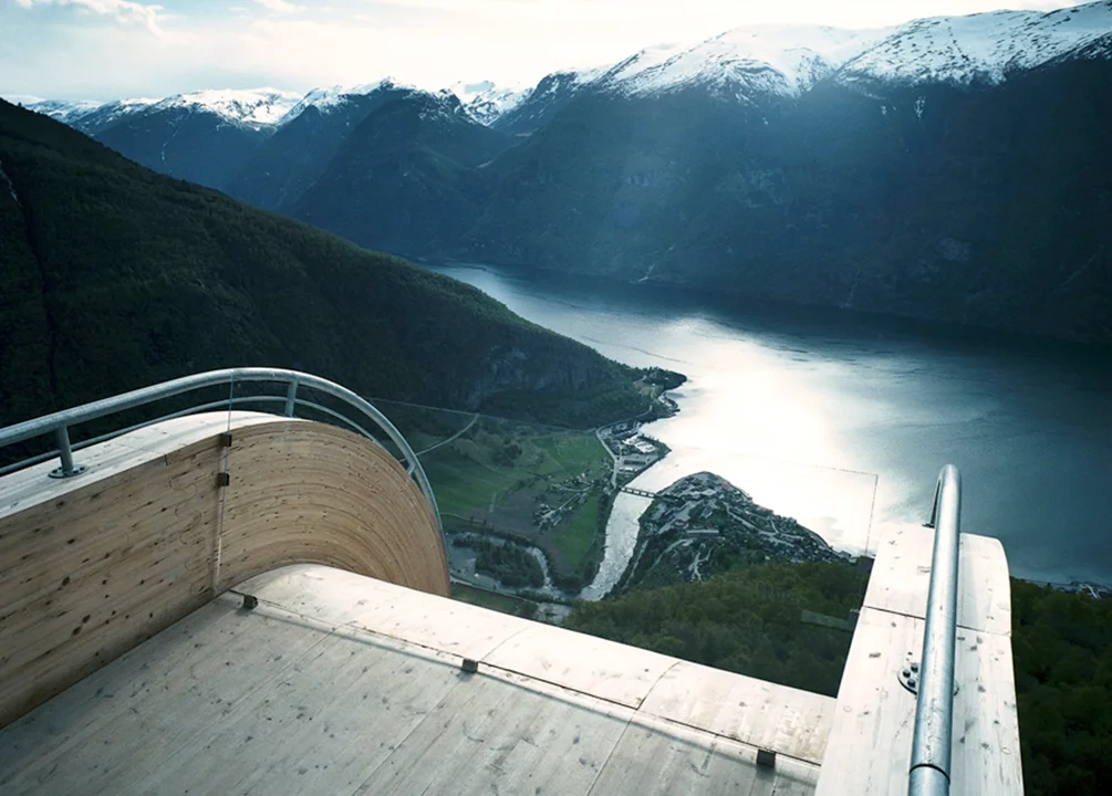 A thin pane of glass keeps visitors from sliding off this futuristic skywalk. The minimalist architecture complements the splendid views of the surroundings.