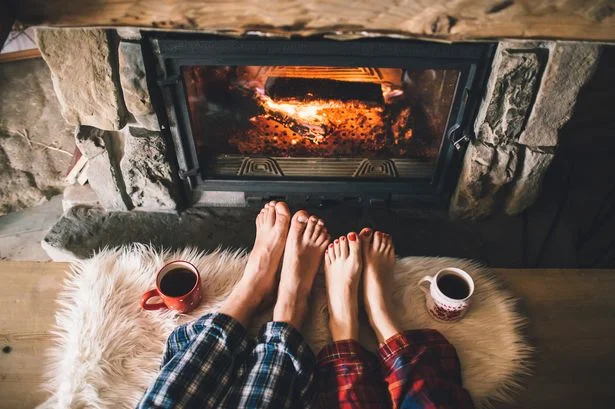 A warm, roaring fire and a mug of your favourite hot drink - perfect ingredients for finding hygge at home! Image source