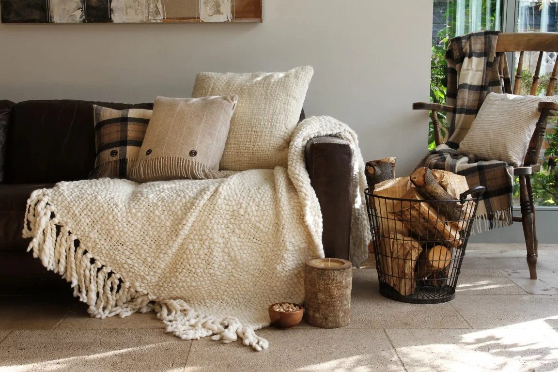 These neutral yet still warm tones, and comfortable fabrics illustrate subtle examples of how you can bring a bit of hygge to your home. Image source