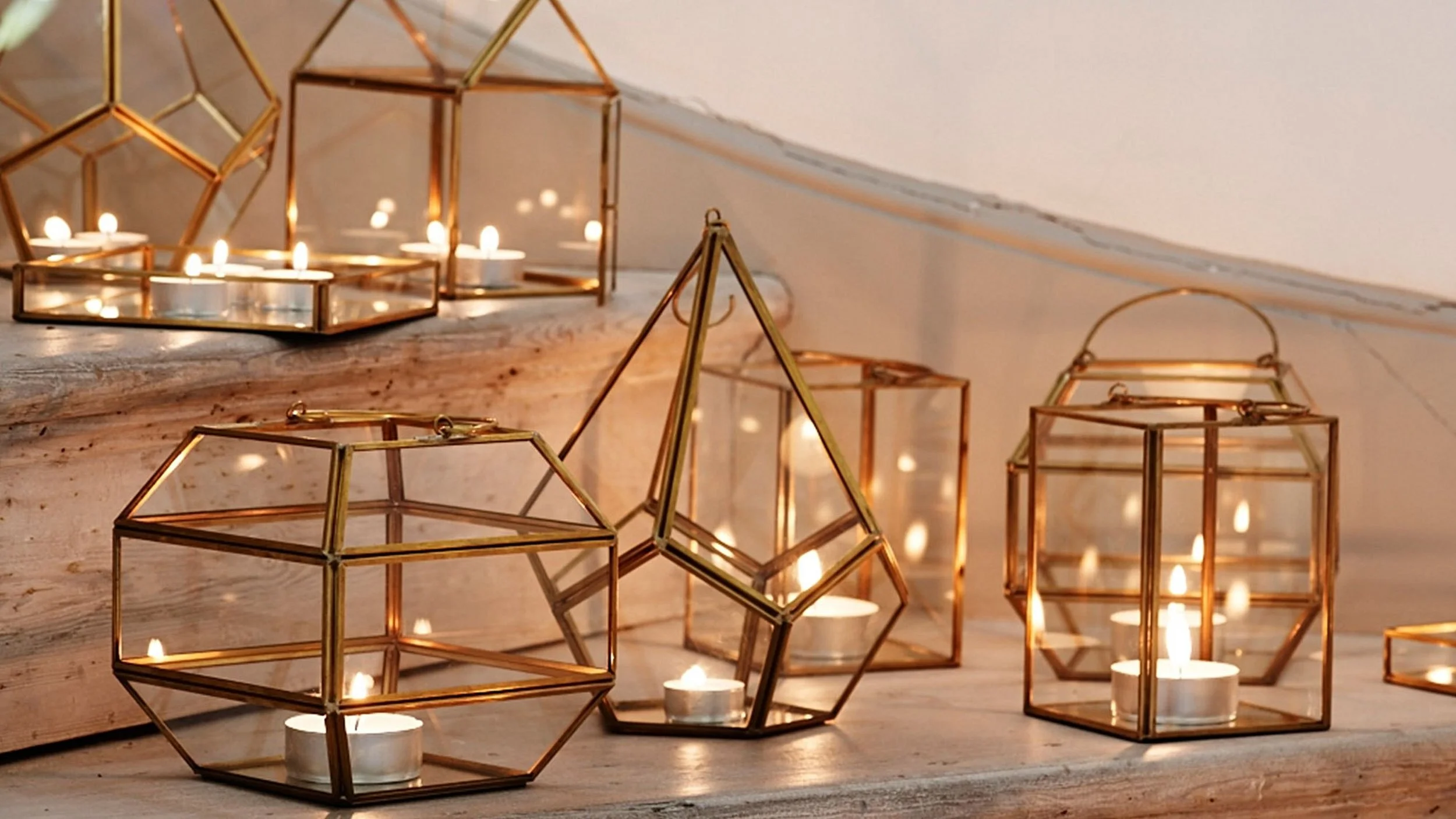 Candles bring warmth and soft, cosy lighting effects to any room -an essential yet simple element of any hygge experience. Image source