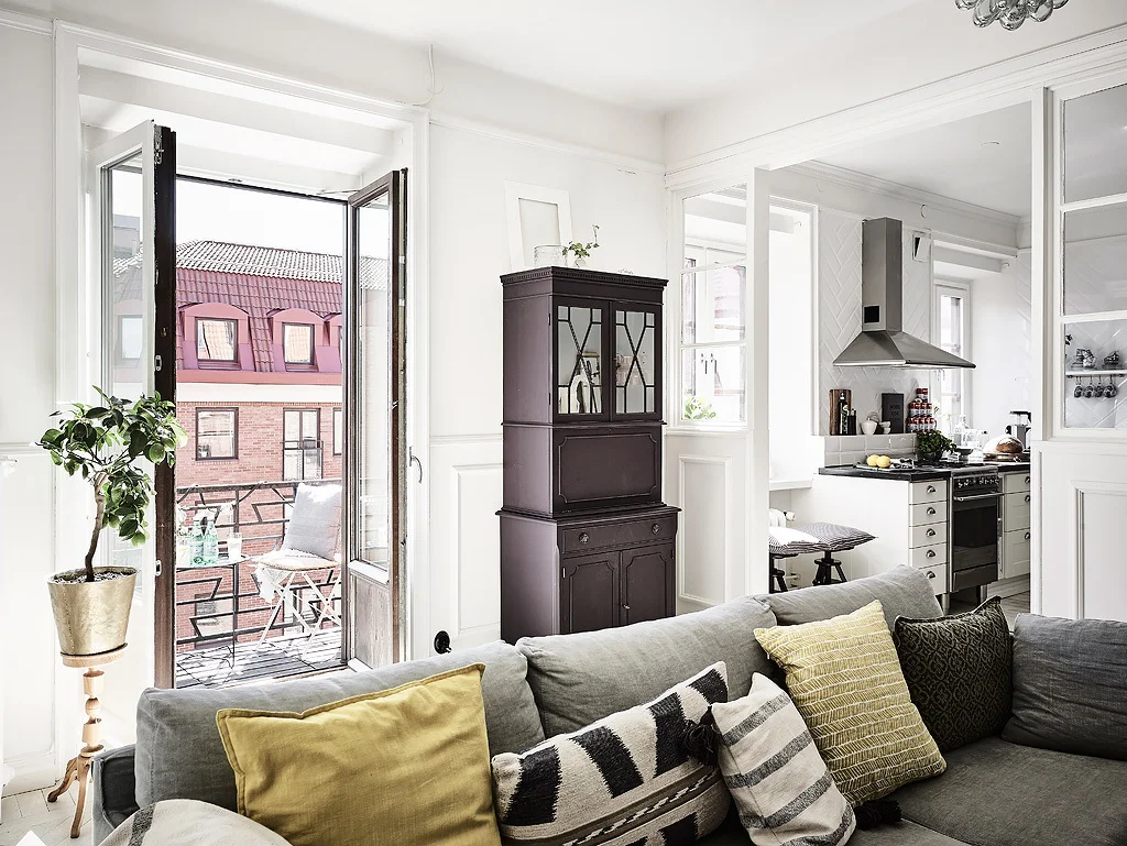 Original antique cabinet for a homely and eclectic feel mixing modern with traditional. 