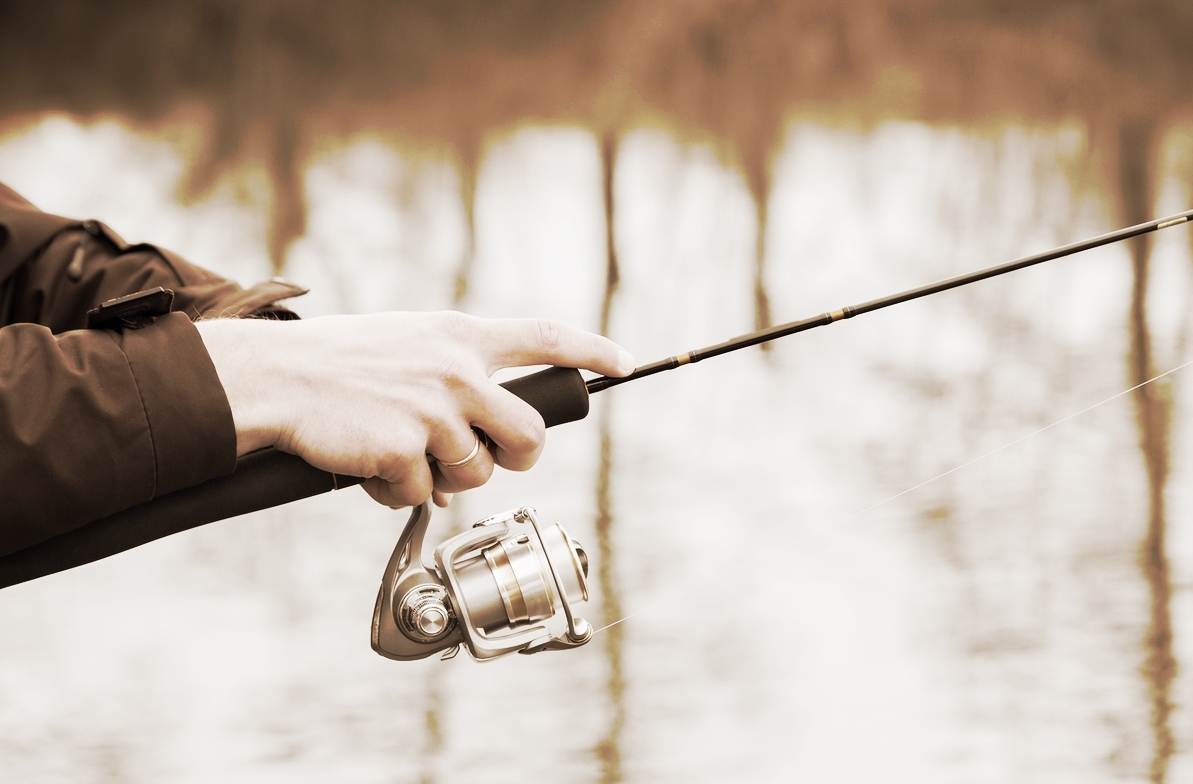 bigstock-Winter-fishing-on-spinning-86443787.jpg