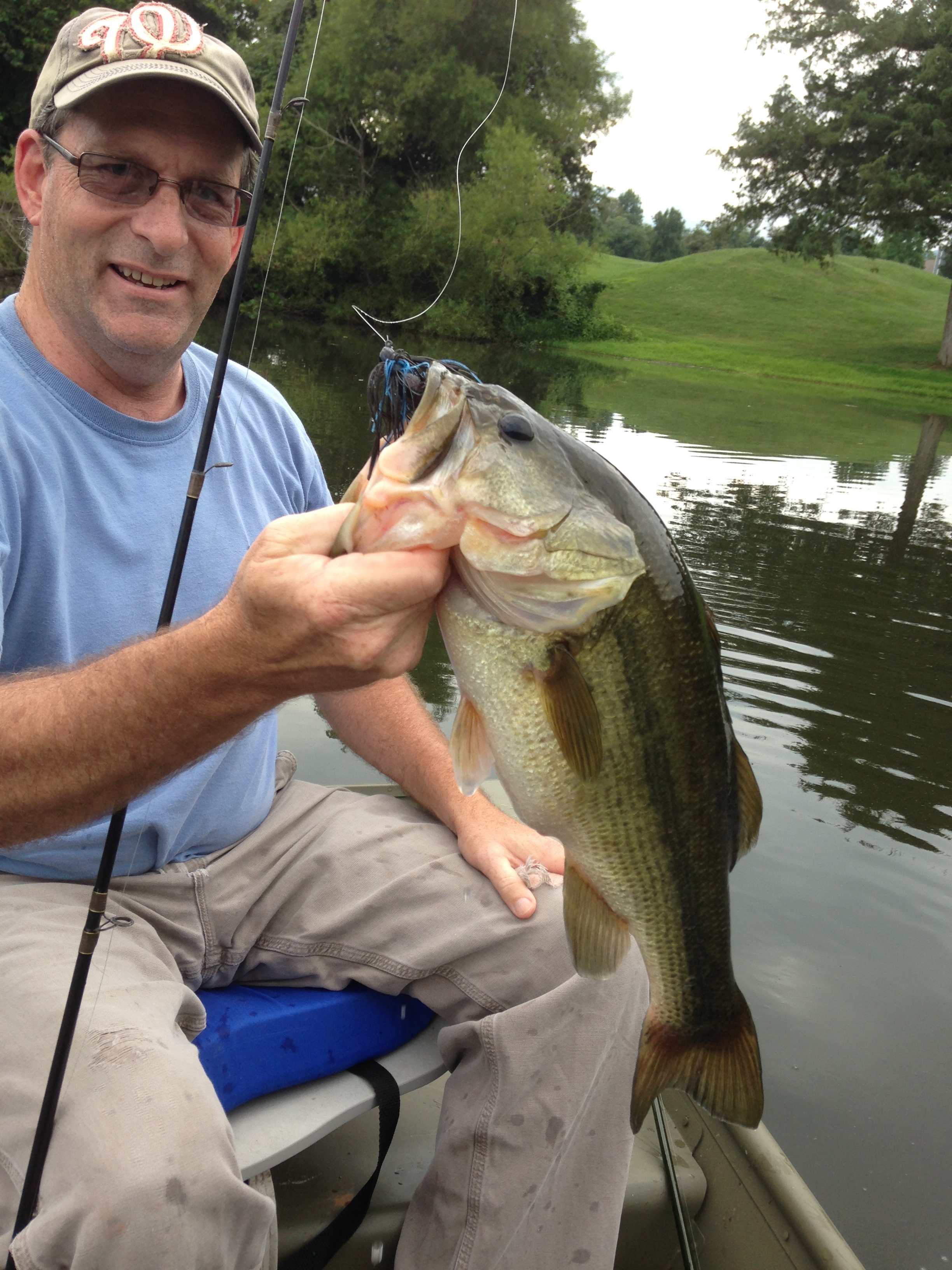 John Holman with yet another largemouth bass on Wintergreen's ponds (2015 photo)