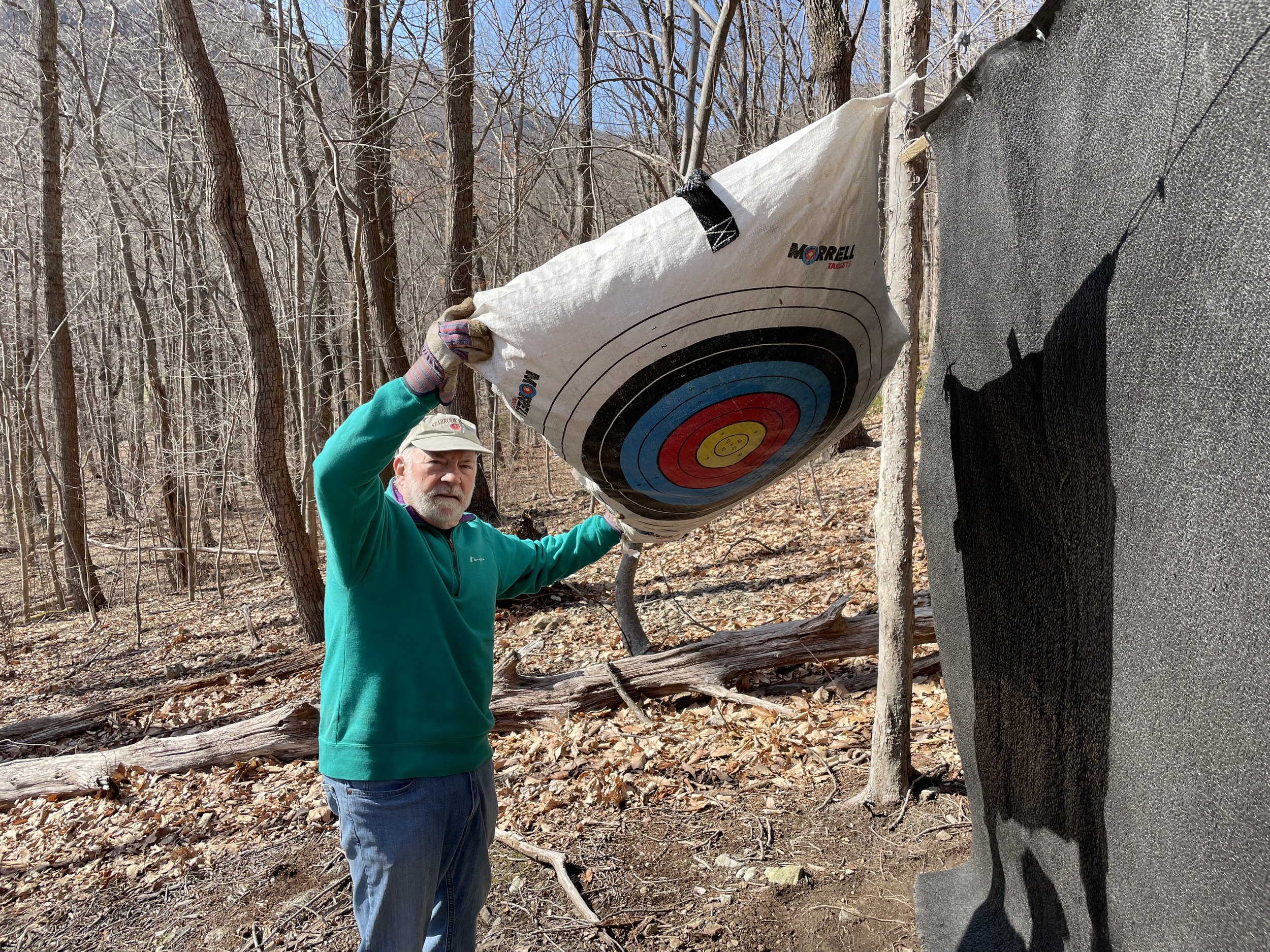   Mike Capps shows how the backside of many of the bag targets still have their color.  