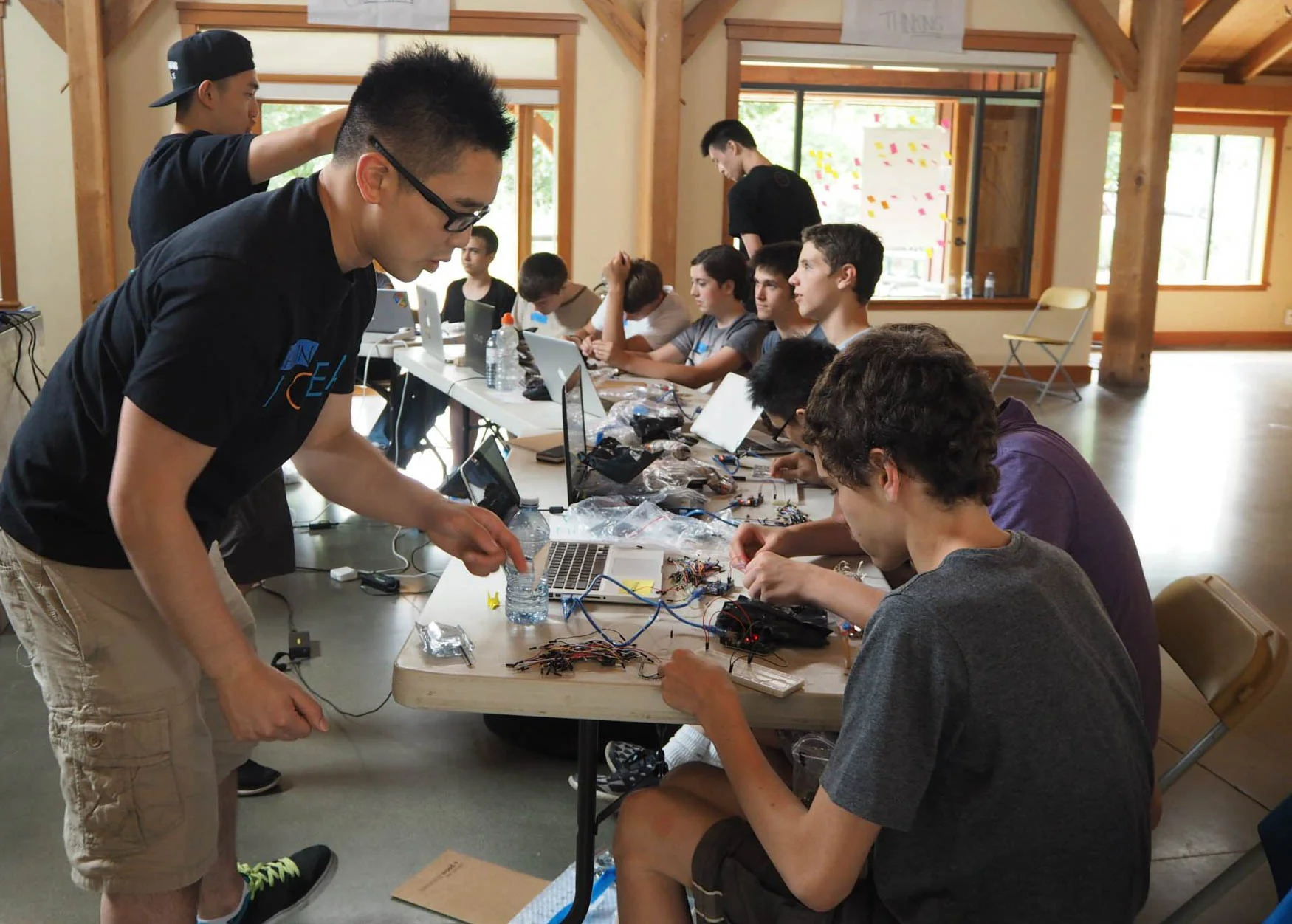 Camp Instructor Carlin Leung helps with some tricky wiring
