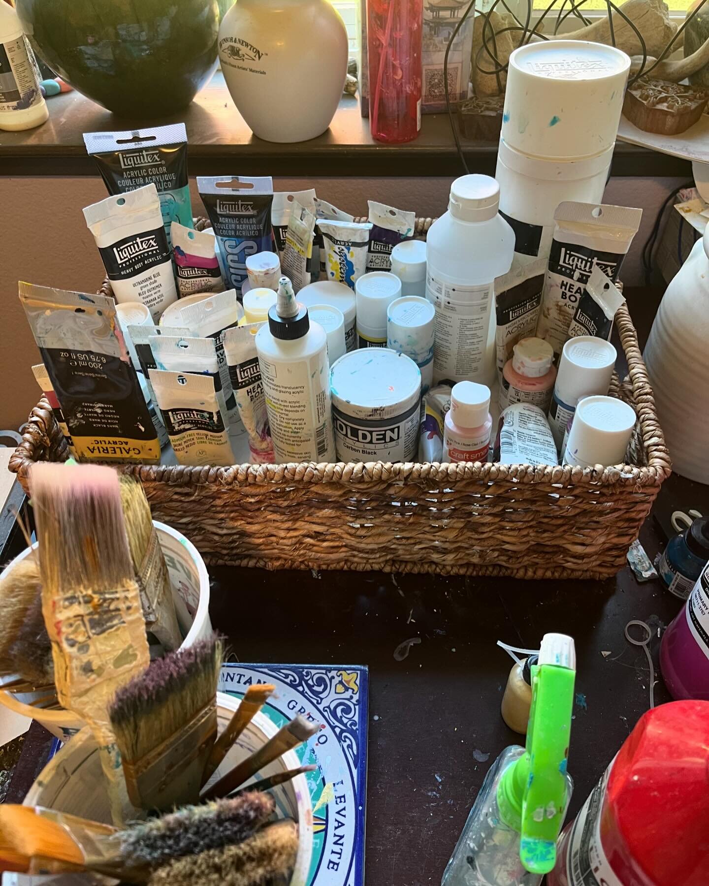 One of the things I struggle most with in a small studio space is how to store paint in a way that easy to get to and keeps them somewhat neat. This basket is my latest attempt. 

How do you organize your art supplies?