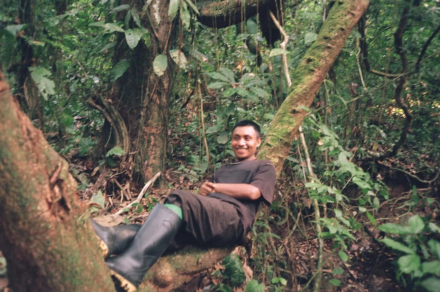  Local guide.. notice the knee high rubber boots to protect from snakes. 
