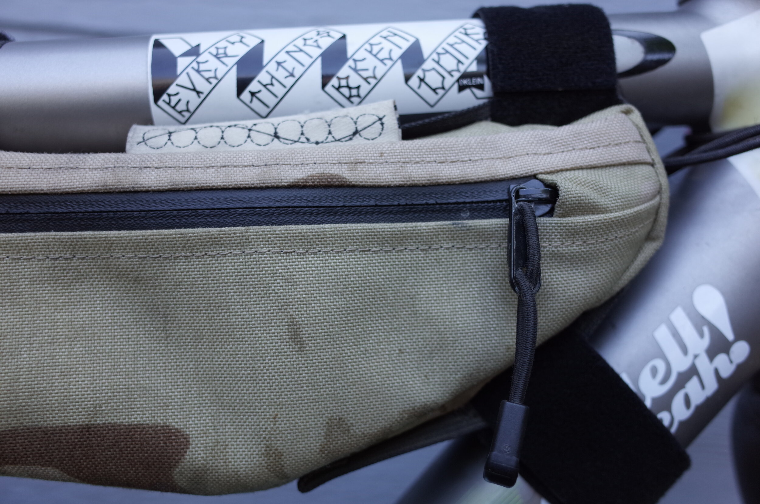  Part of riding bikes during this time of COVID is being prepared to not stop for supplies so as to limit your human contact.  With that in mind I ditched my trusty frame pump for this OuterShell top tube bag.  Designed and built in SF by a long time