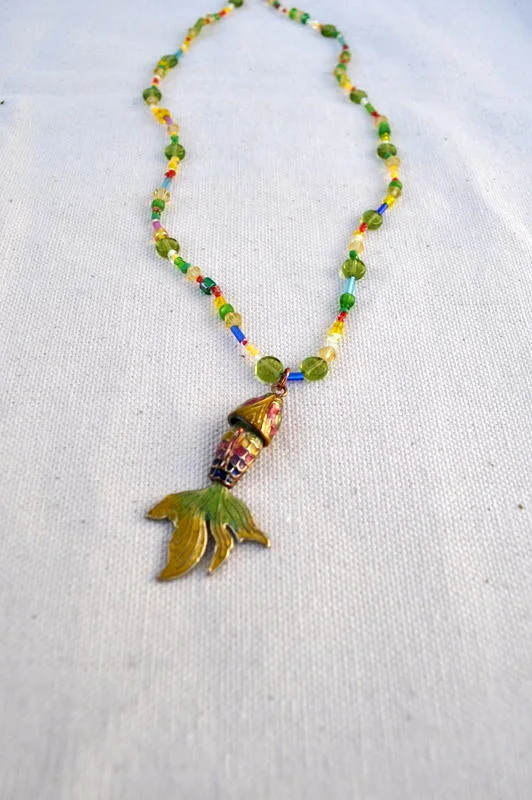 Necklace featuring Fish Pendant & Glass Beads