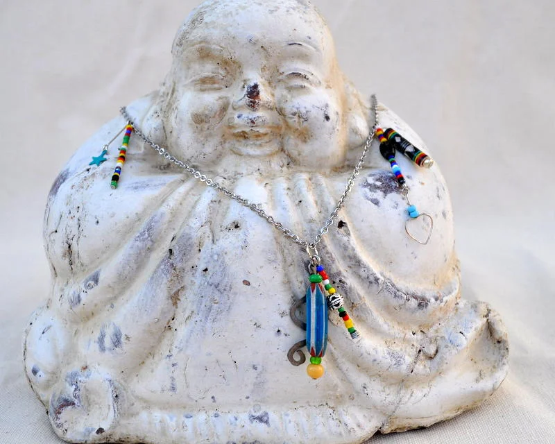 Necklace featuring Clay and Glass Beads with Metal Findings