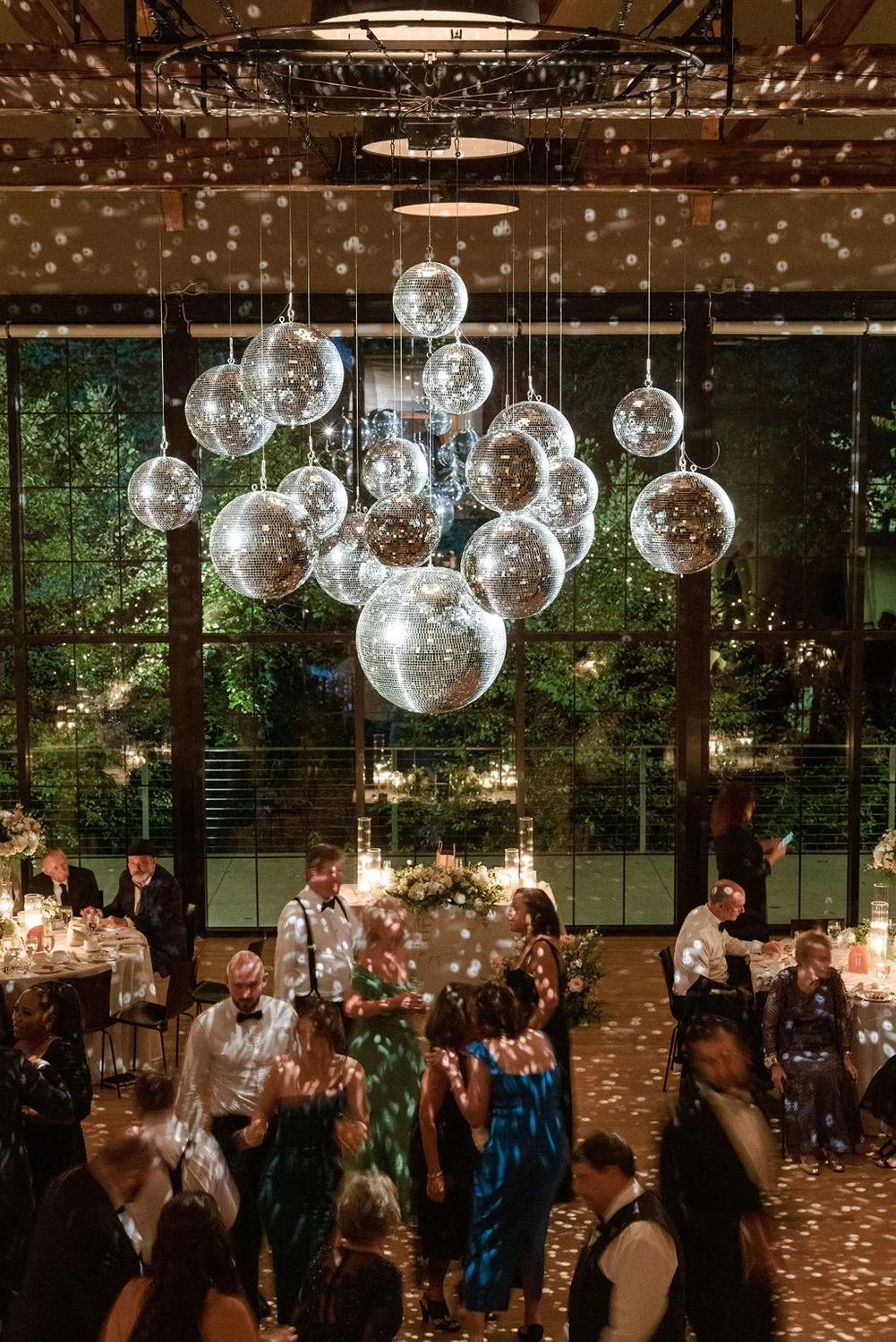 hudson-valley-wedding-with-mirror-discoball-chandelier-in-industrial-beacon-ny-wedding-venue.jpg