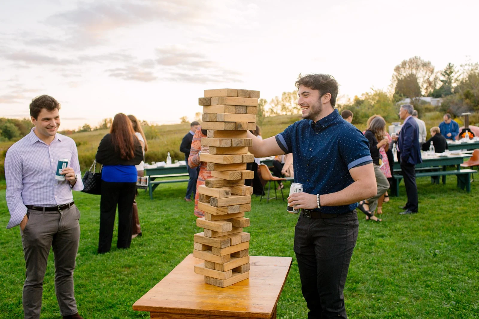 arnold-house-wedding-welcome-party-with-guests-enjoying-a-giant-jenga-game