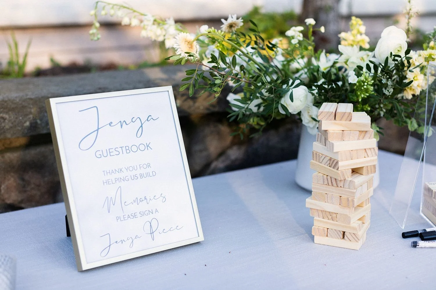 jenga-guestbook-sign-and-game-at-outdoor-wedding-at-beaverkill-valley-inn-in-livingston-manor-ny