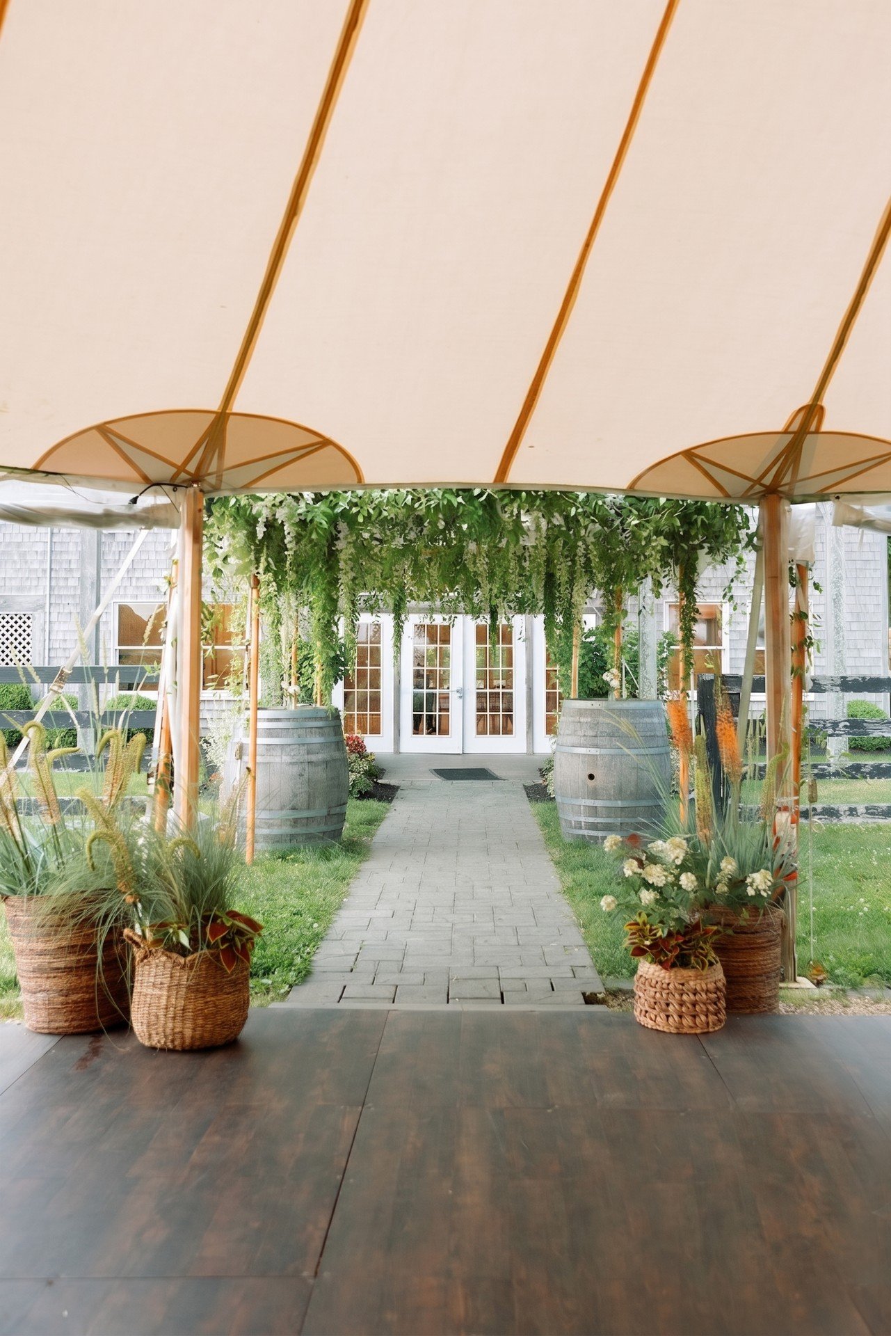 entrance-to-tent-with-hanging-greenery-edited.jpg