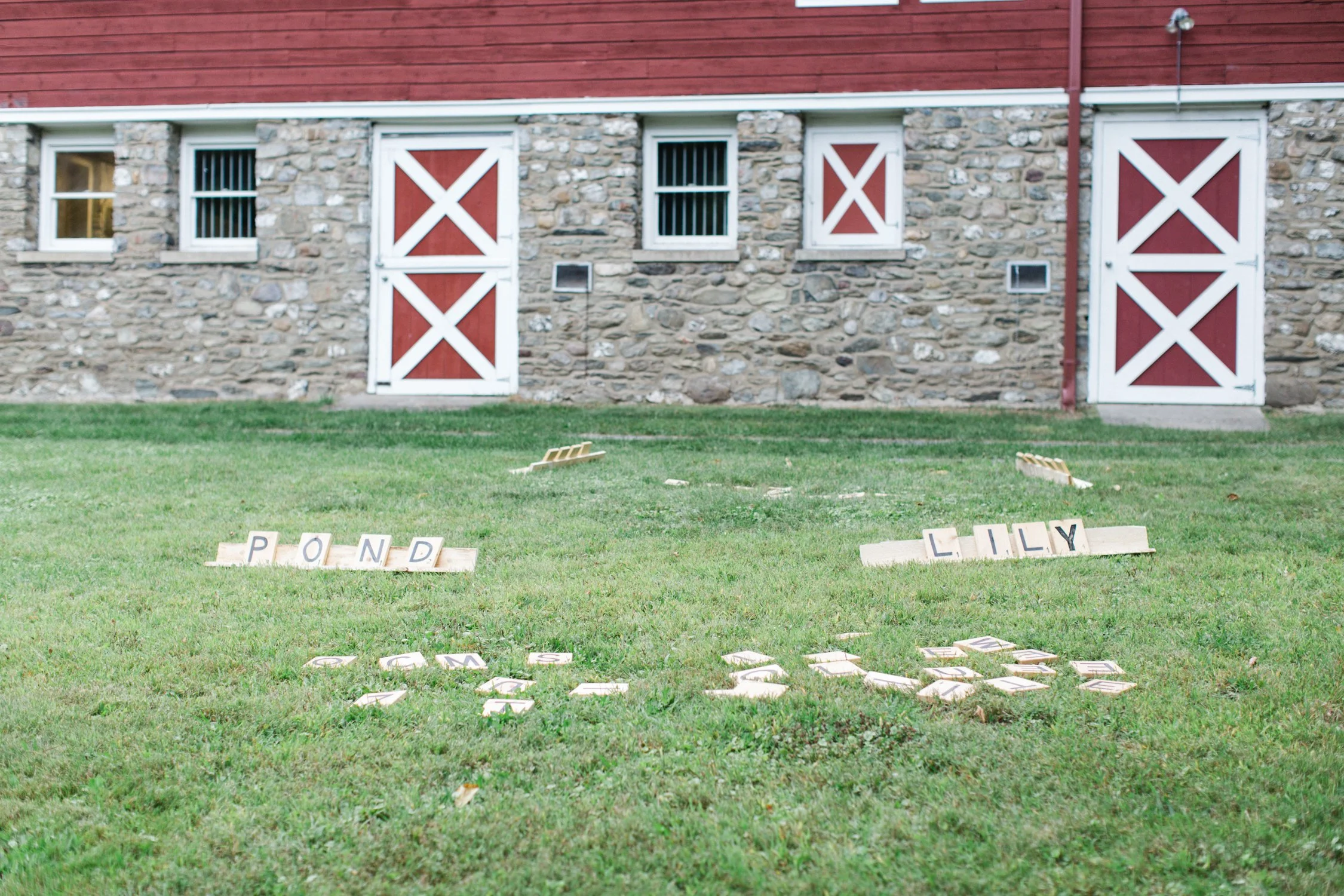 outdoor-cocktail-hour-with-lawn-games-with-a-giant-scrabble-game-in-hudson-valley-ny