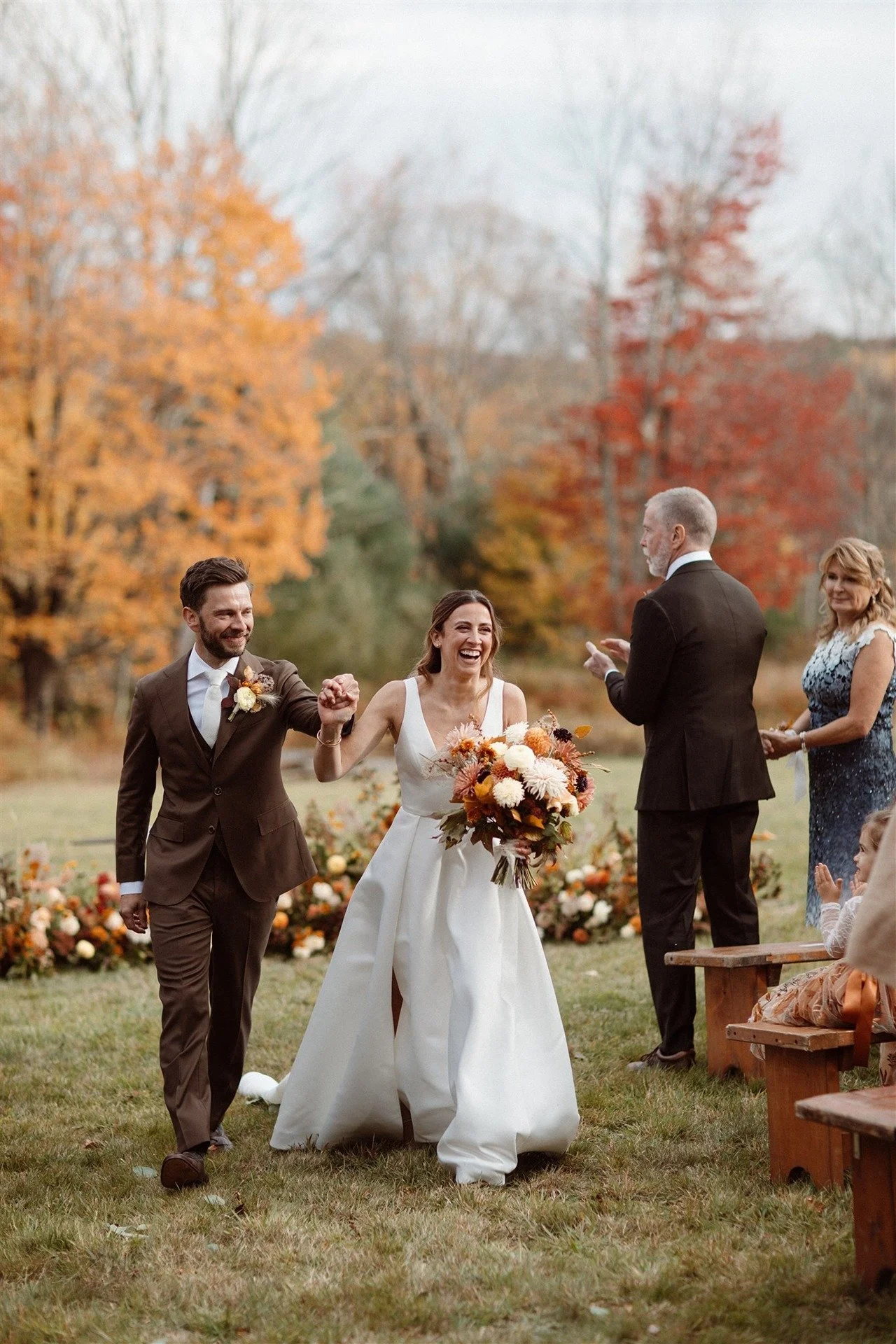 Bride-And-Groom-Walking-Back-Up-The-Aisle-After-Their-Outdoor-Ceremony-In-The-Hudson-Valley