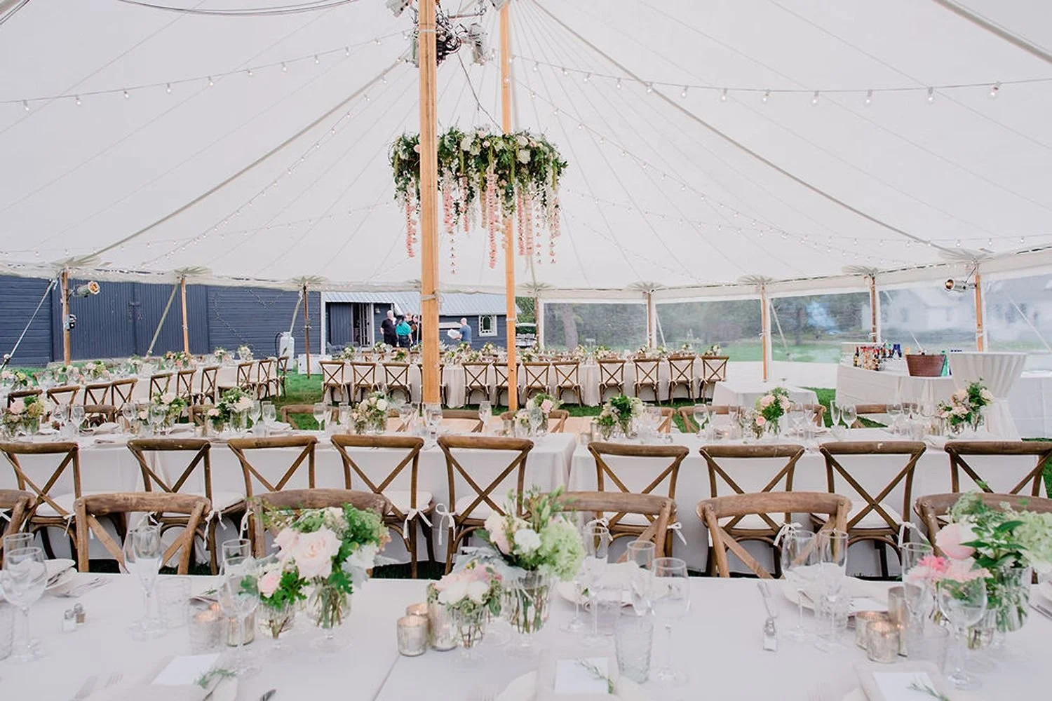 sailcloth-tent-wedding-white-linens-cross-back-chairs-blush-and-white.jpg