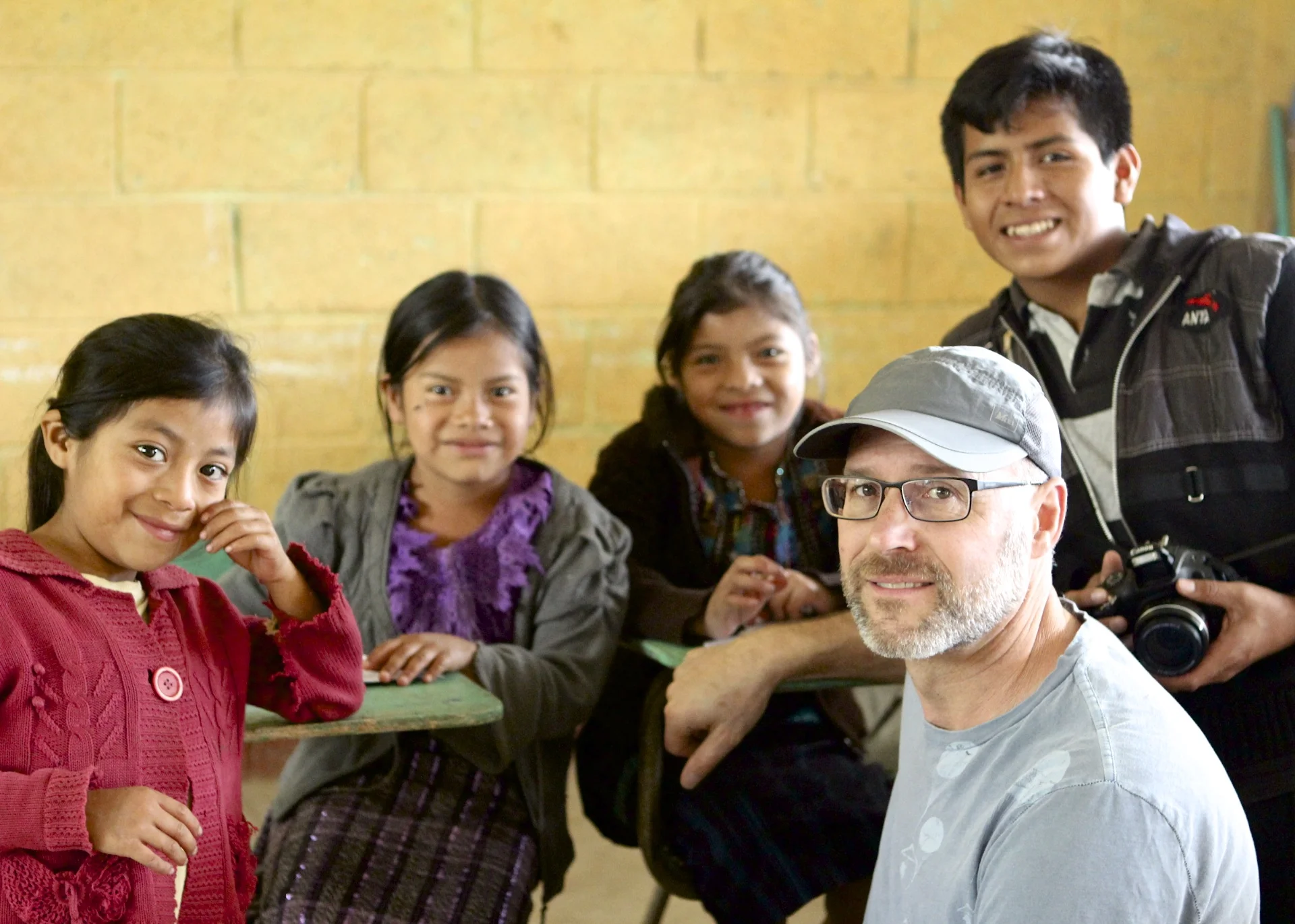 Randy, administrator at Hallmark Retirement Communities, with Juan Antonio, one of our scholarship students. Juan Antonio teaches these children on Saturdays, when they come for voluntary extra tutoring in their school subjects, like math, reading, and even English. 