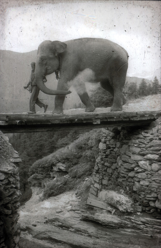 Crossing a high mountain bridge.